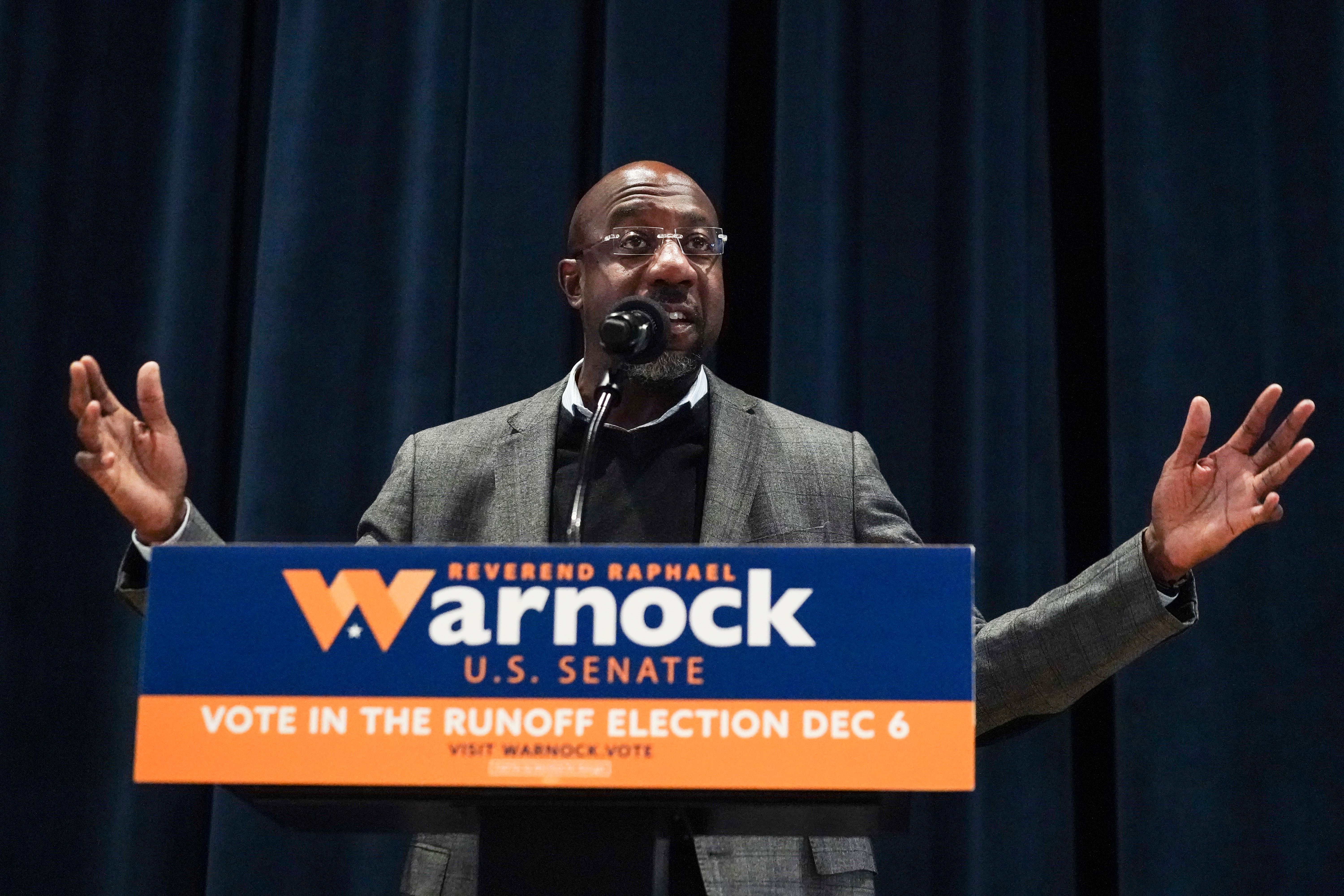 U.S. Sen. Raphael Warnock, D-Ga., speaks during a campaign rally at Georgia Tech Monday, Dec. 5, 2022, in Atlanta. Warnock is in a runoff with Republican Herschel Walker. (AP Photo/John Bazemore)